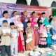 Teladani Bupati Fauzi, IBM Foundation Bagi-Bagi Daging Kurban dan Santuni Puluhan Anak Yatim